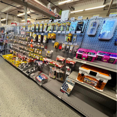 A display of fishing supplies within Village Hardware & Rental. 